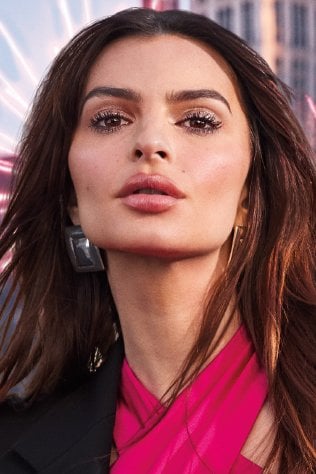 Model wearing Maybelline Lash Sensational Firework mascara showing lifted, fanned lashes in bold lash look.
